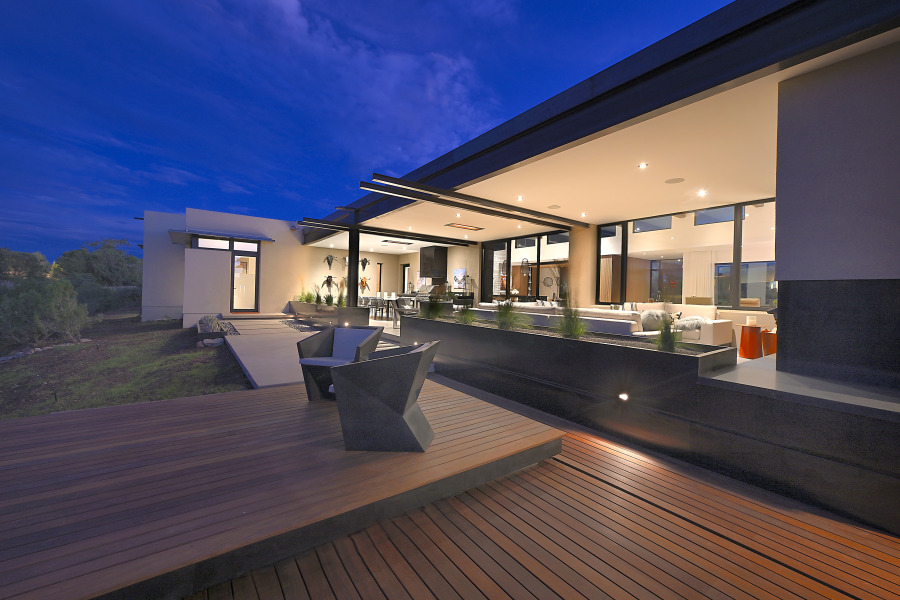 Ample Outdoor Entertaining. Elevated Deck conceals a hot tub.